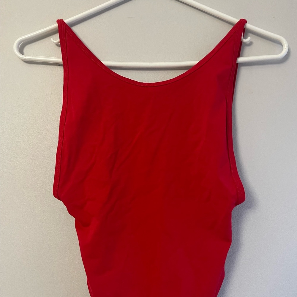 TNA red open back body suit - NEVER WORN perfect condition